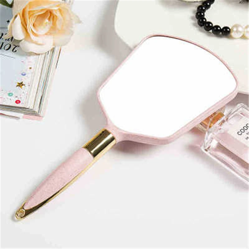 Hand held mirror