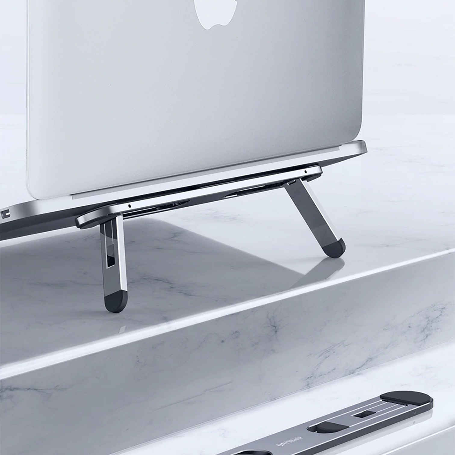 ultra-portable-laptop-riser-ILkIq0vJ51DzhiWgxNzl.png
