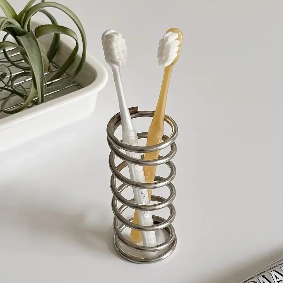 Spring Toothbrush Caddy