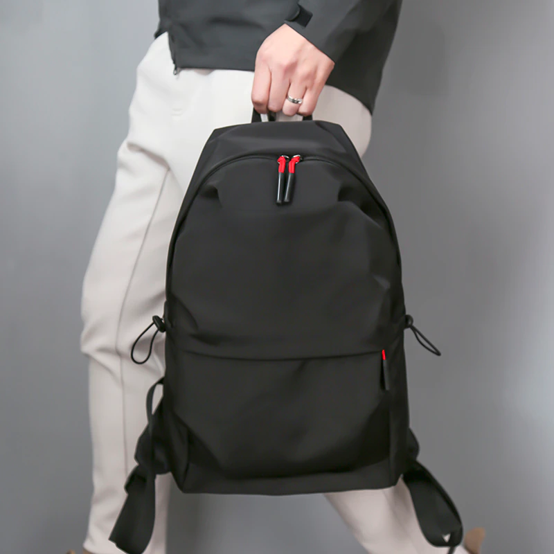 Black Ruffle Backpack
